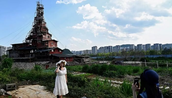 Netizens describe Chens residence as Chinas strangest nail house, likening it to madcap buildings in Miyazakis Studio Ghibli masterpieces