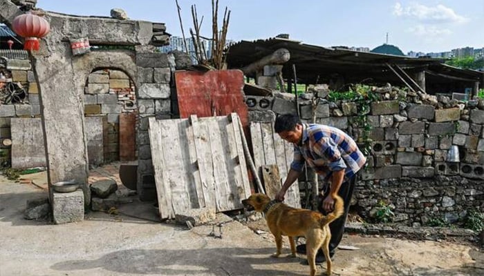 Chen refused to leave and after resort project faltered, defied a flurry of demolition notices to build his familys humble stone bungalow higher and higher.