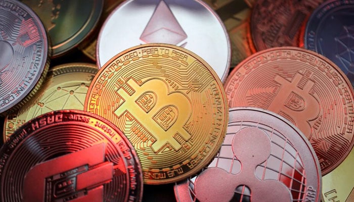 Representations of cryptocurrencies including Bitcoin, Dash, Ethereum, Ripple and Litecoin are seen in this illustration picture taken June 2, 2021.