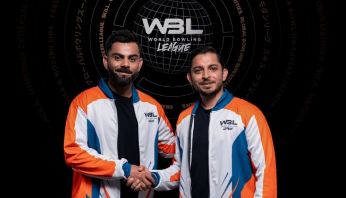Virat Kohli (left) with World Bowling League founder Adi K Mishra. — World Bowling League/File