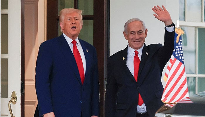 US President Donald Trump speaks as Israeli Prime Minister Benjamin Netanyahu waves following a meeting in the White House, in Washington, US on April 7, 2025. — Reuters
