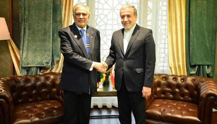 Deputy Prime Minister and Foreign Minister Senator Ishaq Dar (left) meets with Irans Foreign Minister Abbas Araqchi in the undated image. — PID/File